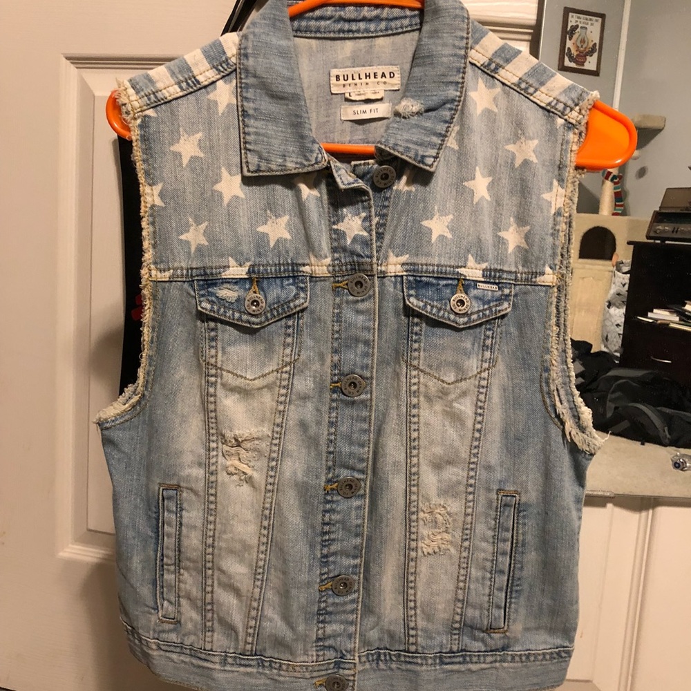 Distressed denim vest